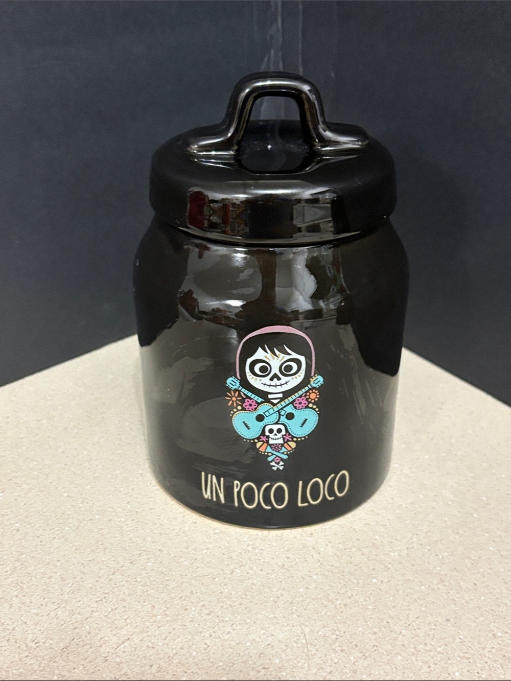 Rae Dunn Disney Pixar Coco "Un Poco Loco" black ceramic canister